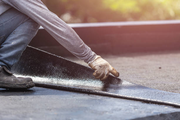 Professional Waterproofing technician working in Ithaca, MI